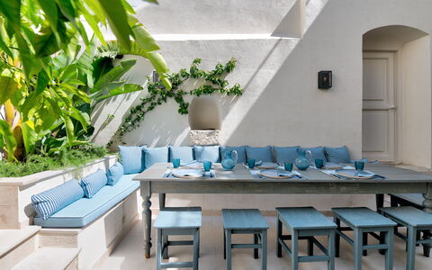 Dimora Cocchi: Table, Furniture, Plant, Property, Chair, Azure, Building, Houseplant, Interior Design, Wall