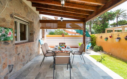 Riomar Beach House: Food, Table, Tableware, Plant, Furniture, Sky, Chair, Dishware, Plate, Outdoor Furniture