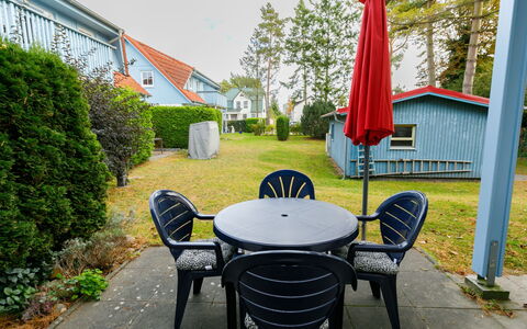 Jacobs: Plant, Property, Furniture, Building, Table, Sky, Chair, Tree, Shade, Grass