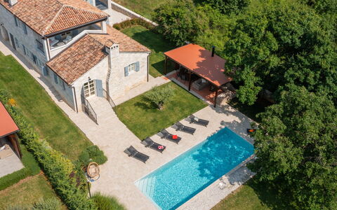 Villa Grando i: Sky, Plant, Furniture, Plant Community, Table, Natural Landscape, Chair, Land Lot, Outdoor Furniture, Tree