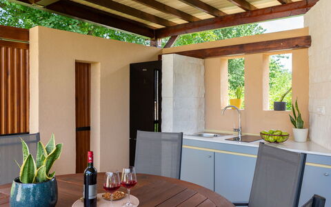 Villa Grando i: Sky, Plant, Furniture, Plant Community, Table, Natural Landscape, Chair, Land Lot, Outdoor Furniture, Tree