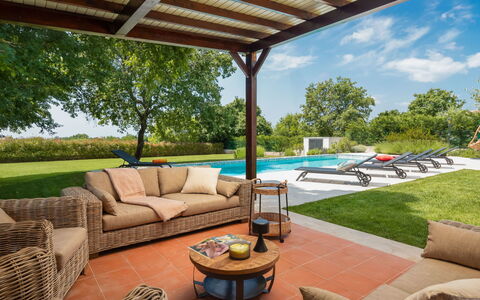 Villa Grando i: Sky, Plant, Furniture, Plant Community, Table, Natural Landscape, Chair, Land Lot, Outdoor Furniture, Tree