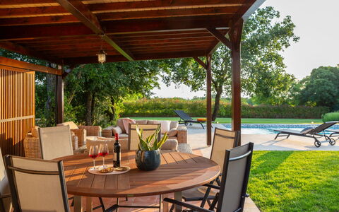 Villa Grando i: Sky, Plant, Furniture, Plant Community, Table, Natural Landscape, Chair, Land Lot, Outdoor Furniture, Tree