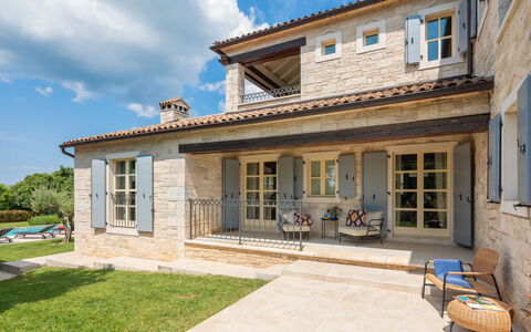 Villa Grando i: Sky, Plant, Furniture, Plant Community, Table, Natural Landscape, Chair, Land Lot, Outdoor Furniture, Tree