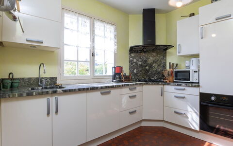 L'Ilet: Cabinetry, Countertop, Property, Kitchen Stove, Kitchen Appliance, Kitchen, Kitchen Sink, Wood, Interior Design, Lighting
