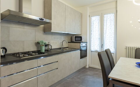 Livia: Cabinetry, Furniture, Countertop, Kitchen Sink, Building, Table, Tap, Kitchen Stove, Sink, Kitchen Appliance