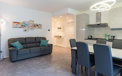 Livia: Furniture, Table, Couch, Azure, Building, Chair, Comfort, Interior Design, Architecture