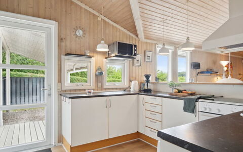 Isto - 250M from the Sea: Wood, Ceiling, Kitchen, Interior Design, Home, Flooring, House, Major Appliance, Countertop, Kitchen Appliance