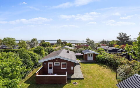 Felicity - 250M from the Sea: Roof, House, Land Lot, Home, Cottage, Estate, Garden Buildings, Shade, Log Cabin, Landscaping