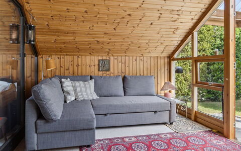 Konrad - 700M from the Sea: Furniture, Flooring, Couch, Interior Design, Floor, Wood, Room, Living Room, Wood Flooring, Ceiling