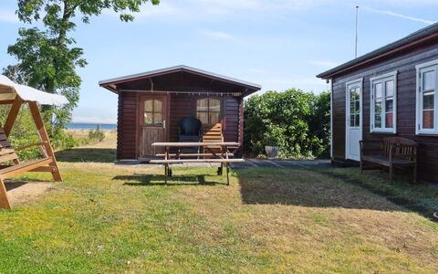Mirkka - 50M from the Sea: Blue, Shrub, Cottage, Groundcover, Garden, Estate, Shade, Landscaping, Farmhouse, Eco Hotel