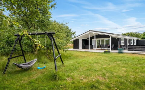 Bentine - 400M from the Sea: Roof, House, Home, Cottage, Door, Siding, Deck, Porch, Plank, Hardwood