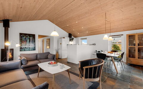 Fietje - 500M to the Fjord: Furniture, Interior Design, Flooring, Couch, Ceiling, Wood, Light Fixture, Floor, Living Room, Room