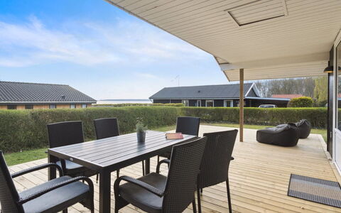 Arnetta - 150M from the Sea: Wood, Furniture, Home, Door, Porch, Shade, Wood Stain, Hardwood, Chair, Deck