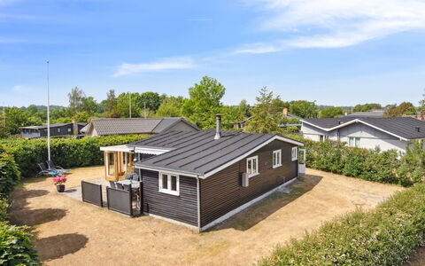 Sari - 250M from the Sea: Building, House, Home, Roof, Residential Area, Cottage, Siding, Estate, Suburb, Landscaping
