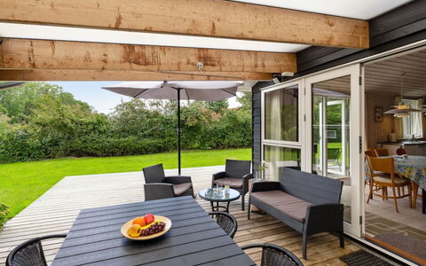 Rikus - 300M from the Sea: Roof, Home, Door, Cottage, Shade, Siding, Yard, Estate, Backyard