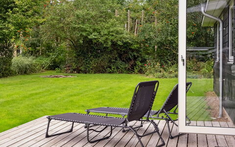 Rikus - 300M from the Sea: Roof, Home, Door, Cottage, Shade, Siding, Yard, Estate, Backyard