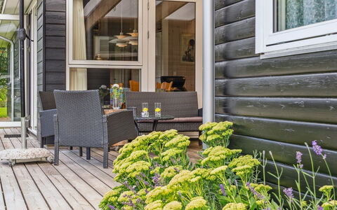 Rikus - 300M from the Sea: Roof, Home, Door, Cottage, Shade, Siding, Yard, Estate, Backyard