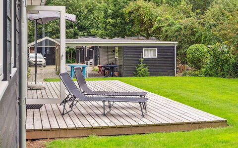Rikus - 300M from the Sea: Roof, Home, Door, Cottage, Shade, Siding, Yard, Estate, Backyard