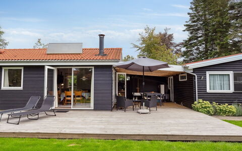 Rikus - 300M from the Sea: Roof, Home, Door, Cottage, Shade, Siding, Yard, Estate, Backyard