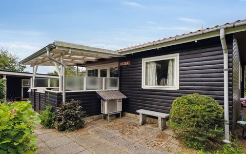 Rikus - 300M from the Sea: Roof, Home, Door, Cottage, Shade, Siding, Yard, Estate, Backyard