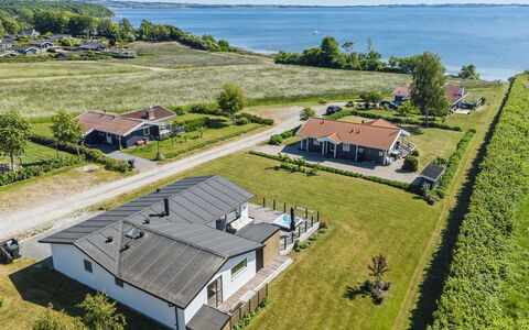 Niska - 200M from the Sea: Roof, Home, Door, Cottage, Shade, Siding, Yard, Estate, Backyard