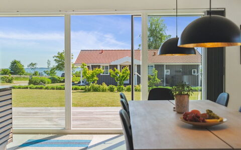 Niska - 200M from the Sea: Roof, Home, Door, Cottage, Shade, Siding, Yard, Estate, Backyard