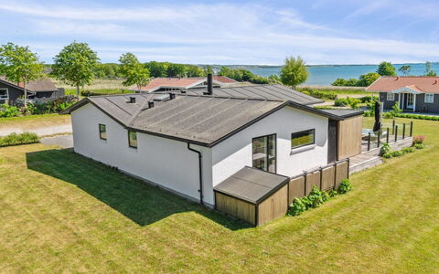 Niska - 200M from the Sea: Roof, Home, Door, Cottage, Shade, Siding, Yard, Estate, Backyard