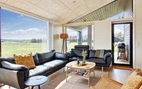 Serey - 1.4Km from the Sea: Living Room, Ceiling, Couch, Wood Flooring, Hardwood, Chair, Coffee Table, Light Fixture