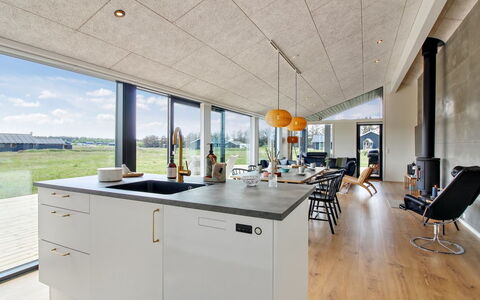 Serey - 1.4Km from the Sea: Ceiling, Chair, Kitchen, Kitchen & Dining Room Table, Countertop, Design, Light Fixture, Cabinetry, Daylighting, Wood Flooring