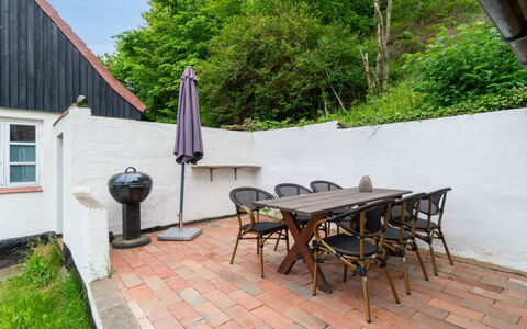 Scarlet - 5M from the Sea: Furniture, Outdoor Furniture, Outdoor Table, Chair, Garden, Flowerpot, Backyard, Flagstone, Shade, Yard