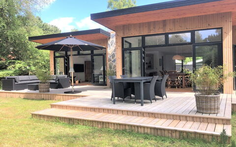 Sune - 175M from the Sea: Furniture, Interior Design, Flooring, Wood, Floor, Ceiling, Wood Flooring, Chair, Table, Lighting