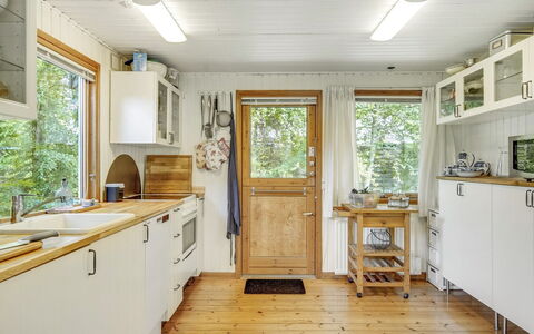 Naili - 750M from the Sea: Wood, Kitchen, Flooring, Interior Design, Countertop, Furniture, Ceiling, Floor, Kitchen Appliance, Wood Stain