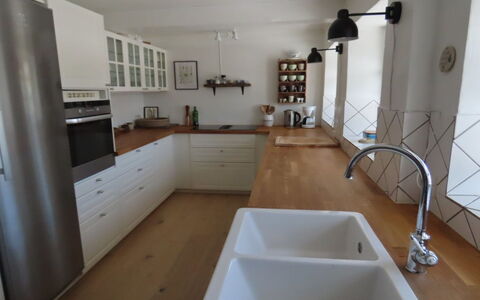 Ilkka - 220M from the Sea: Countertop, Kitchen, Flooring, Cabinetry, Interior Design, Furniture, Kitchen Sink, Floor, Wood, Plumbing Fixture