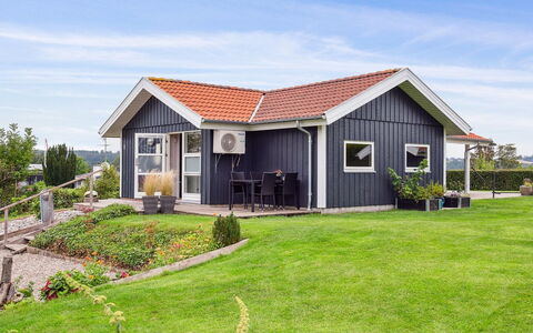 Hjalmsvider - 300M from the Sea: Roof, House, Home, Cottage, Door, Siding, Garden Buildings, Farmhouse, Estate, Porch