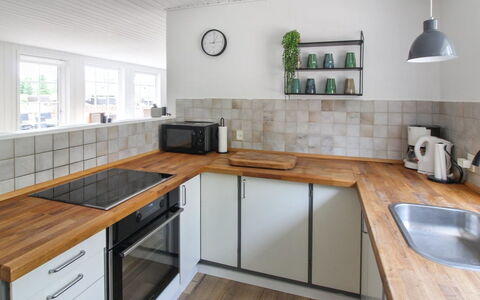 Joona - 12Km from the Sea: Flooring, Countertop, Kitchen, Wood, Floor, Interior Design, Cabinetry, Kitchen Appliance, Furniture, Major Appliance