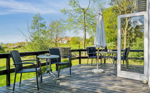 Anne - 150M from the Sea: Roof, Home, Door, Cottage, Shade, Siding, Yard, Estate, Backyard
