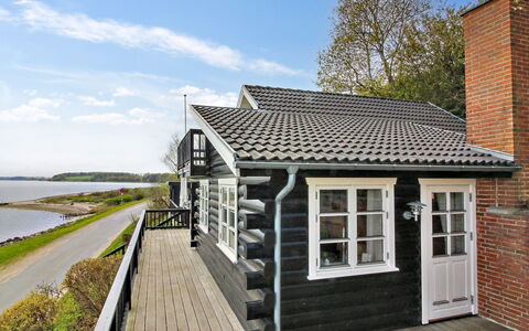 Sander - 10M to the Fjord: Furniture, Interior Design, Flooring, Wood, Floor, Ceiling, Wood Flooring, Chair, Table, Lighting