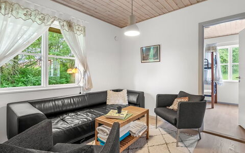 Guthbrand - 800M from the Sea: Furniture, Interior Design, Couch, Flooring, Floor, Wall, Wood, Ceiling, Wood Flooring, Living Room