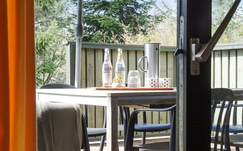 Winter - 500M from the Sea: Furniture, Wood, Chair, Outdoor Furniture, Table, Glass, Outdoor Table, Porch, Kitchen & Dining Room Table, Shade