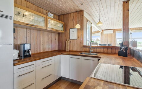 Thomsen - 475M from the Sea: Flooring, Kitchen, Countertop, Interior Design, Wood, Floor, Cabinetry, Ceiling, Wood Flooring, Furniture