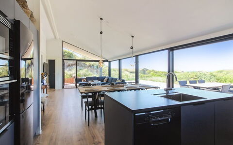Kristiina - 500M from the Sea: Ceiling, Interior Design, Kitchen & Dining Room Table, Wood Flooring, Hardwood, Chair, Shade, Wood Stain, Natural Material, Kitchen