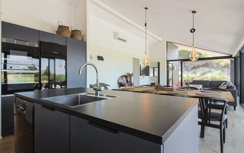 Kristiina - 500M from the Sea: Kitchen, Countertop, Interior Design, Ceiling, Furniture, Kitchen Appliance, Light Fixture, Kitchen & Dining Room Table, Lighting, Flooring