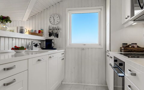 Minka - 58M from the Sea: Kitchen, Countertop, Wood, Interior Design, Major Appliance, Flooring, Kitchen Appliance, Cabinetry, Ceiling, Home