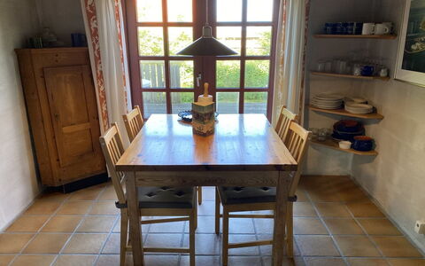 Henke - 100M from the Sea: Furniture, Chair, Flooring, Dining Room, Table, Floor, Interior Design, Kitchen & Dining Room Table, Wood, Room