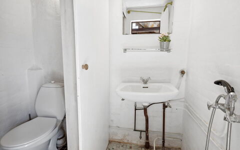 Bedri - 100M from the Sea: Wall, Plumbing Fixture, Bathroom, Bathroom Sink, Toilet Seat, Sink, Floor, Flooring, Toilet, Plumbing