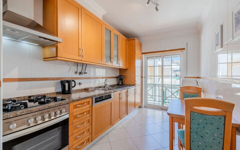 Sunny Beach Casa-M: Kitchen, Flooring, Floor, Countertop, Wood, Cabinetry, Interior Design, Home, Apartment, Major Appliance