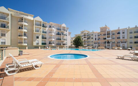 Sunny Beach Casa-M: Building, Sky, Property, Water, Window, Azure, Urban Design, Plant, Condominium, Tower Block
