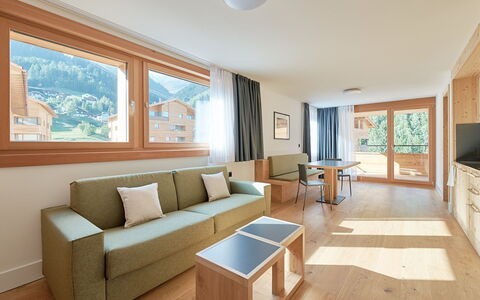 Disentis 50: Furniture, Property, Couch, Window, Table, Wood, Interior Design, Living Room, Flooring, Floor