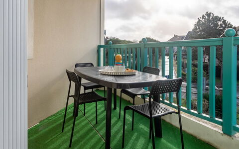Le Belvédère: Table, Furniture, Property, Building, Cloud, Sky, Chair, Shade, Outdoor Furniture, Wood